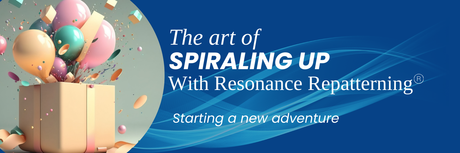 Gold gift box with pastel colored balloons and confetti popping out. The Art of Spiraling Up with Resonance Repatterning. Starting a new adventure.